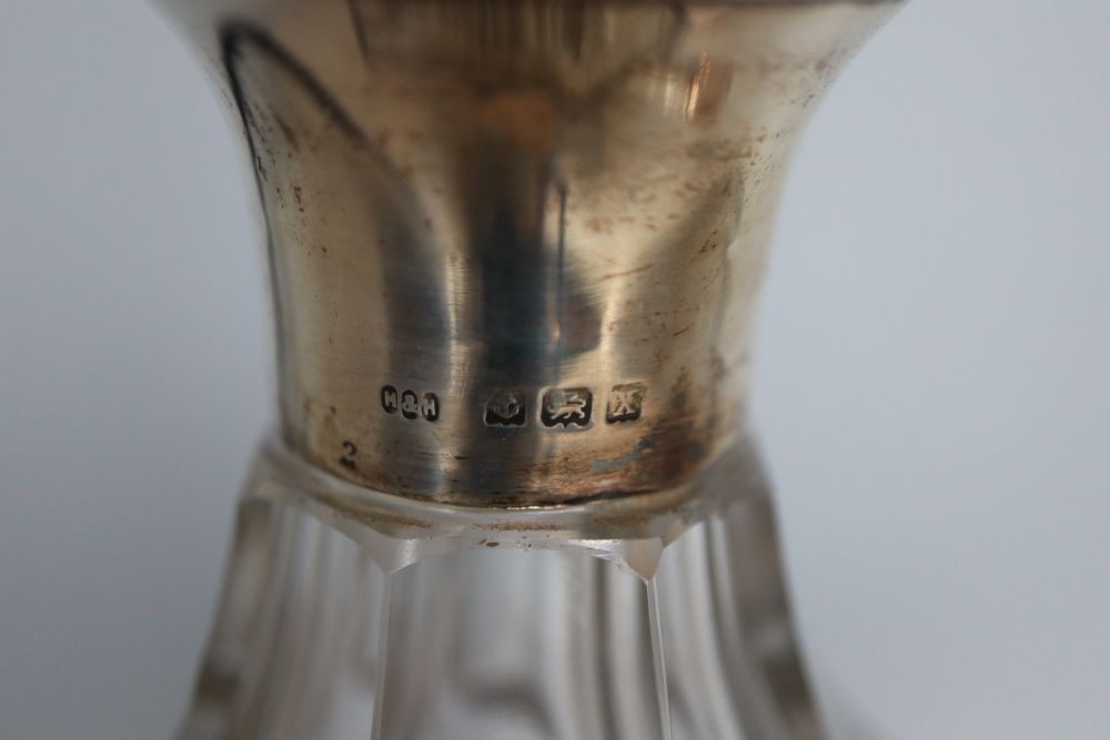 An Art Deco silver-mounted square section glass decanter, Hukin & Heath, Birmingham 1922, 35.5cm and a cut glass scent bottle,
